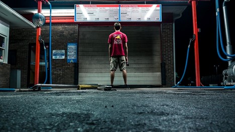 Man Spying on His Car Wash Competitor